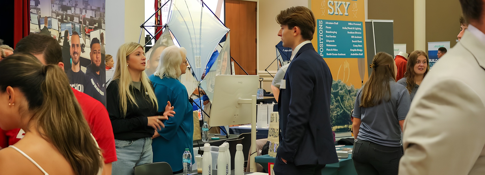 A student talking to a recruiter during the Fair